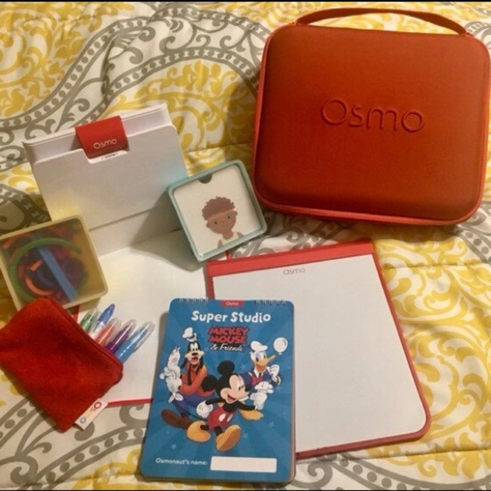 Includes 4 games,+carrying case & Mickey Mouse drawing pad